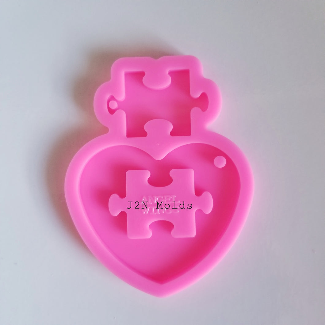 Shiny heart with puzzle mold