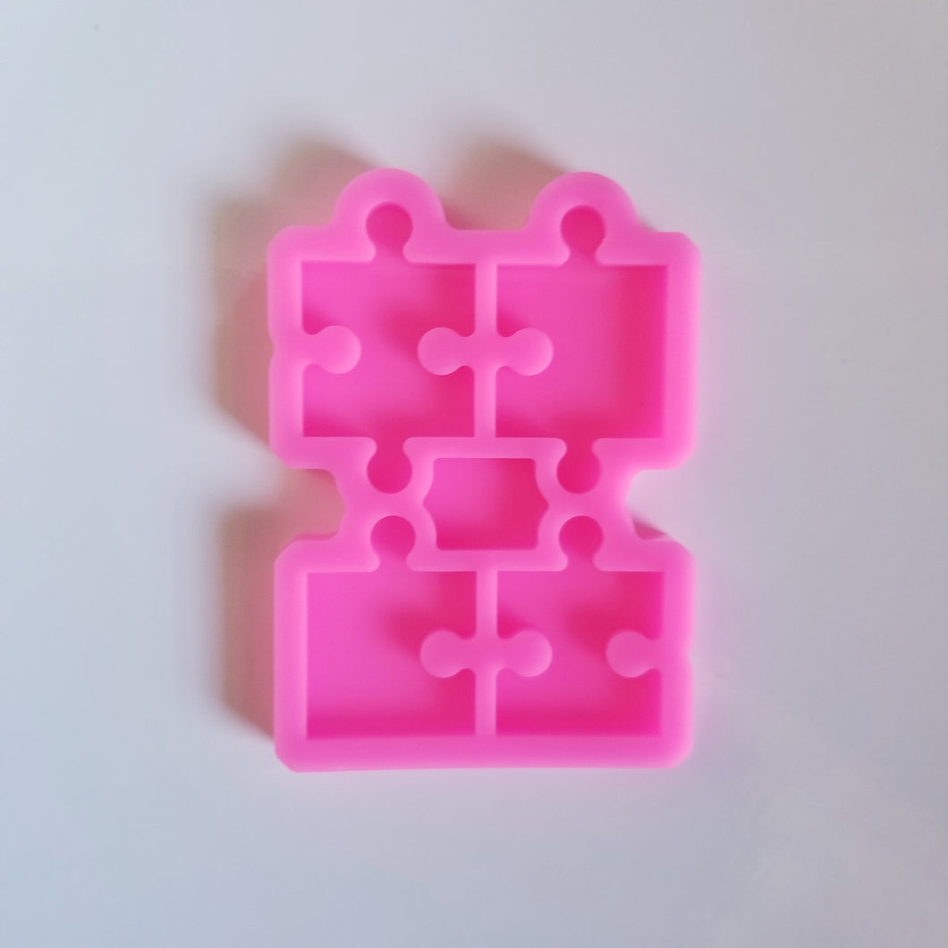 Shiny puzzle piece mold